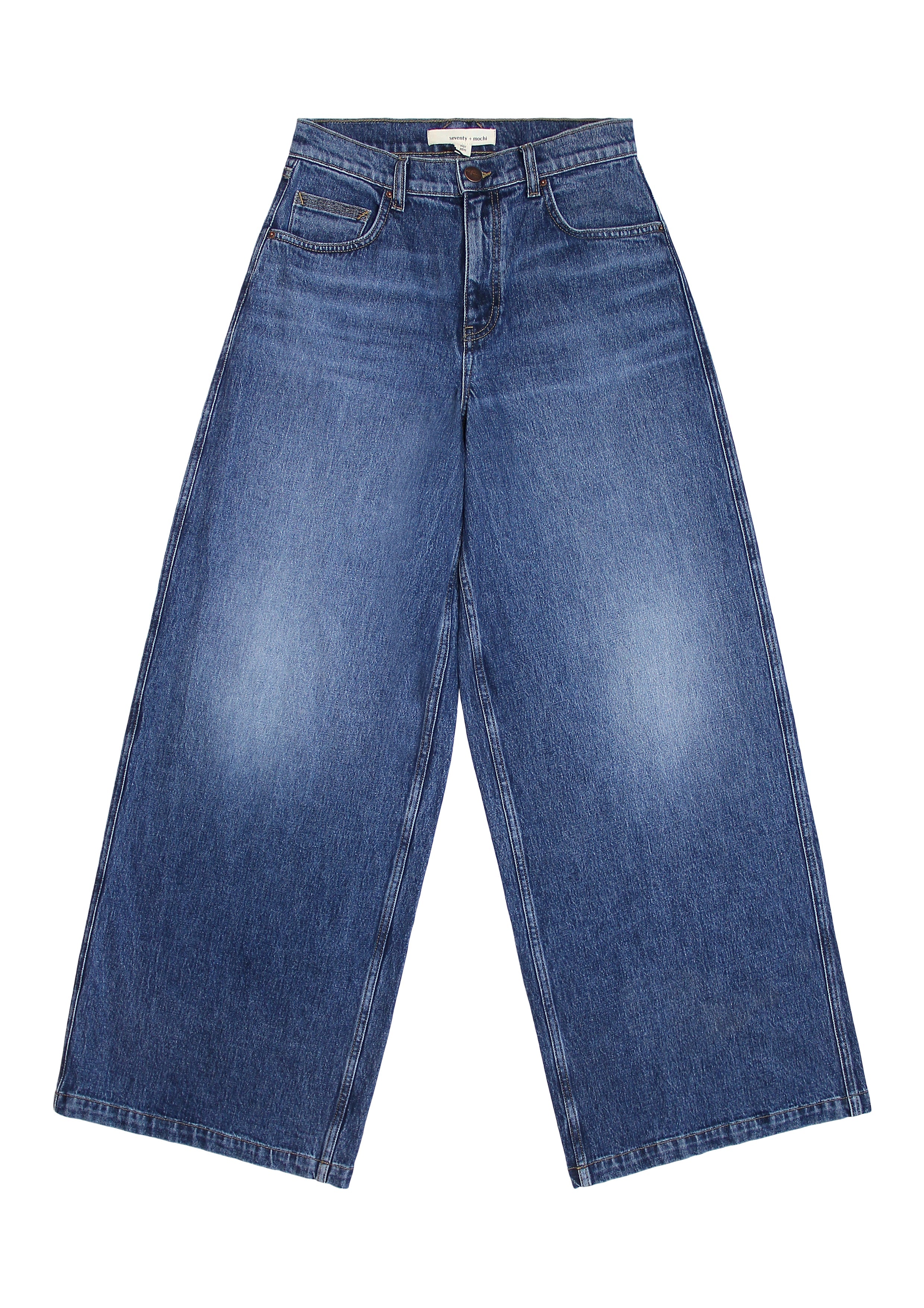 Blue wide leg jeans on a white background